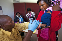 Health worker with client in Namibia