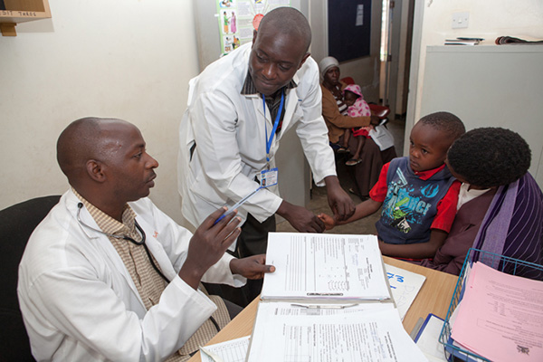 Health workers and clients in Uganda