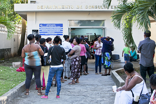 Women wait for testing and counseling services outside of Maternidad Nuestra Señora de la Altagracia Hospital in Santo Domingo, Dominican Republic