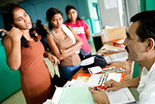 Clients and health worker in Guatemala