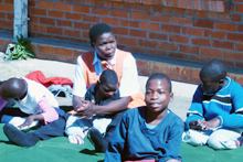 Caregiver and children, Harare
