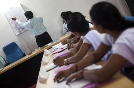 © Photo by Trevor Snapp, courtesy of IntraHealth International. Faculty of the auxiliary nurse midwifery school in Hazaribagh District, India in 2011.