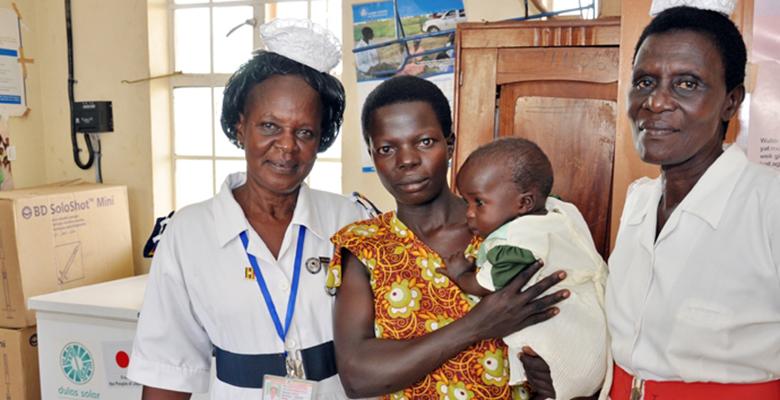 Health worker with client and baby